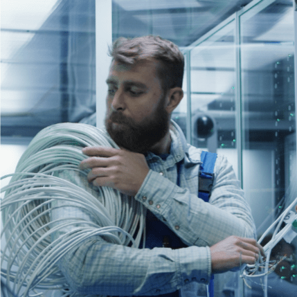 IT professional working on structured cabling project.