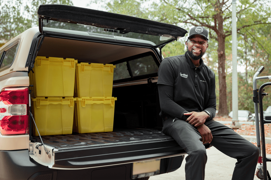 One of our Clear Winds team members delivering computers to a location that receives IT services in Texas.