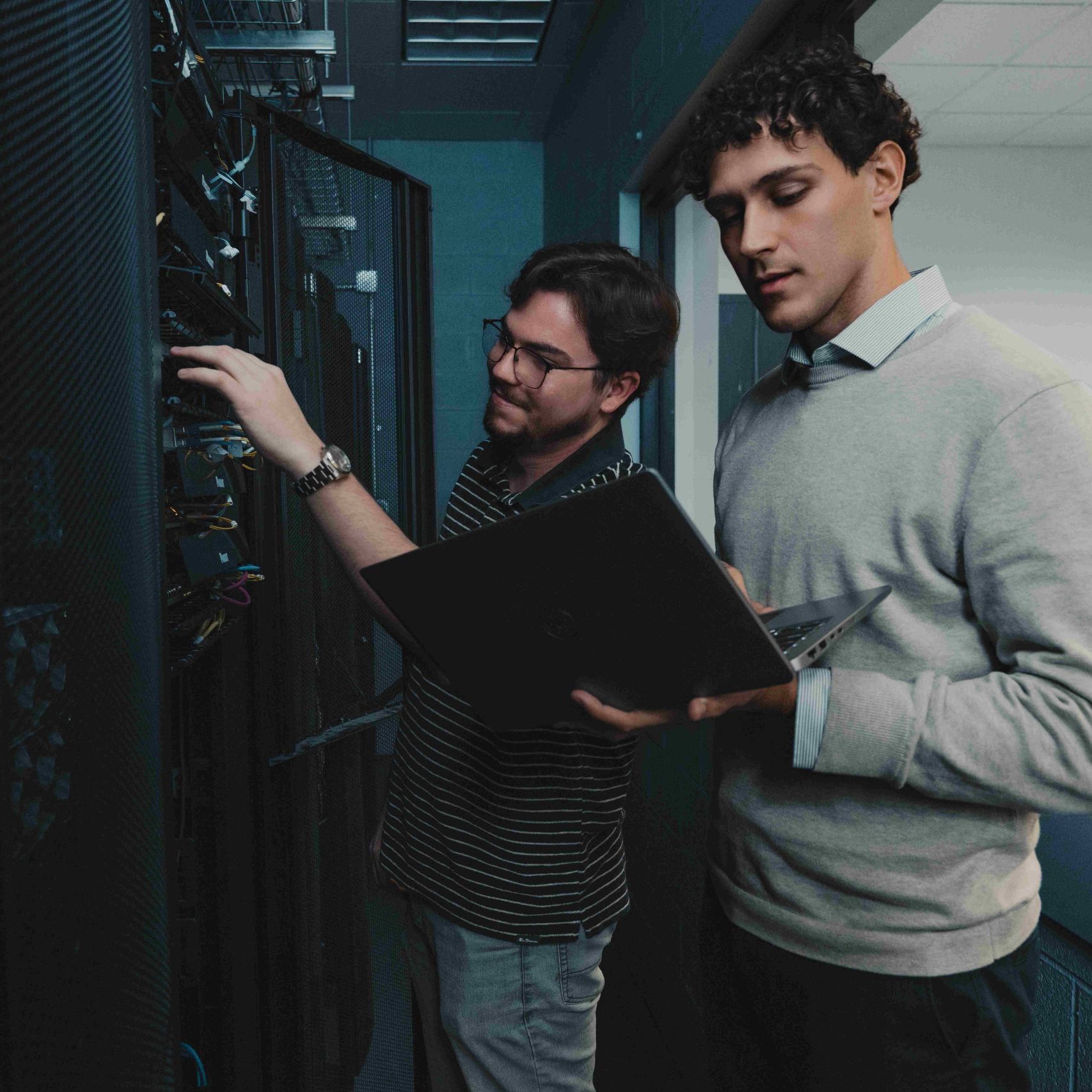 Two engineers with a server