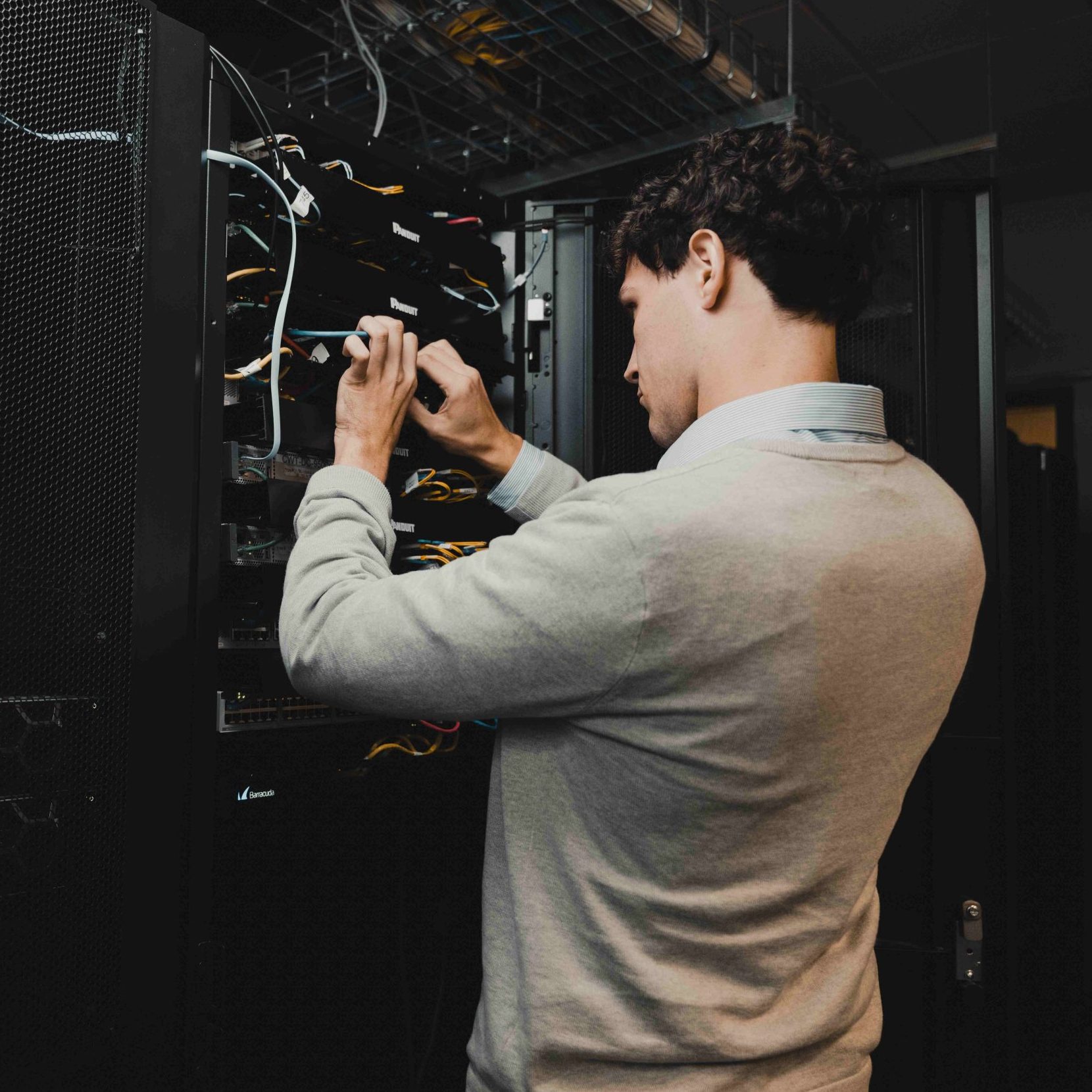 Clear Winds engineer using a server in order to provide IT services in Florida