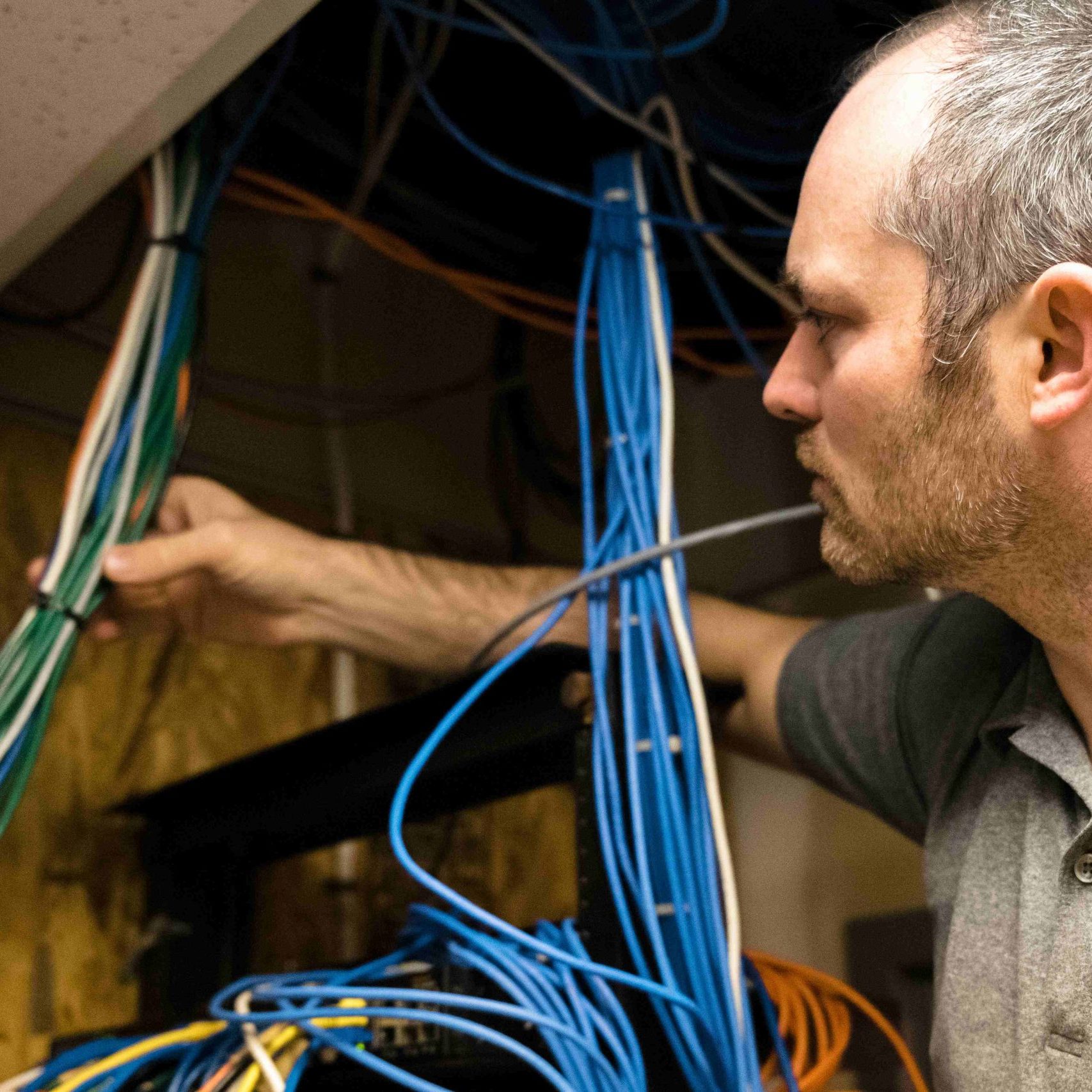 A member of the Clear Winds structured cabling team at a jobsite
