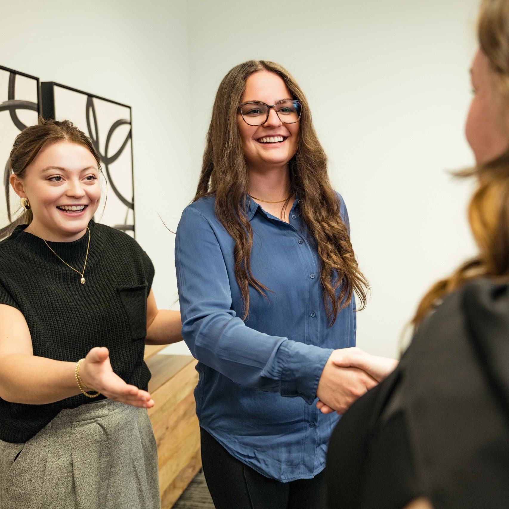 Clear Winds' Enterprise IT services in Brentwood team members with a client.