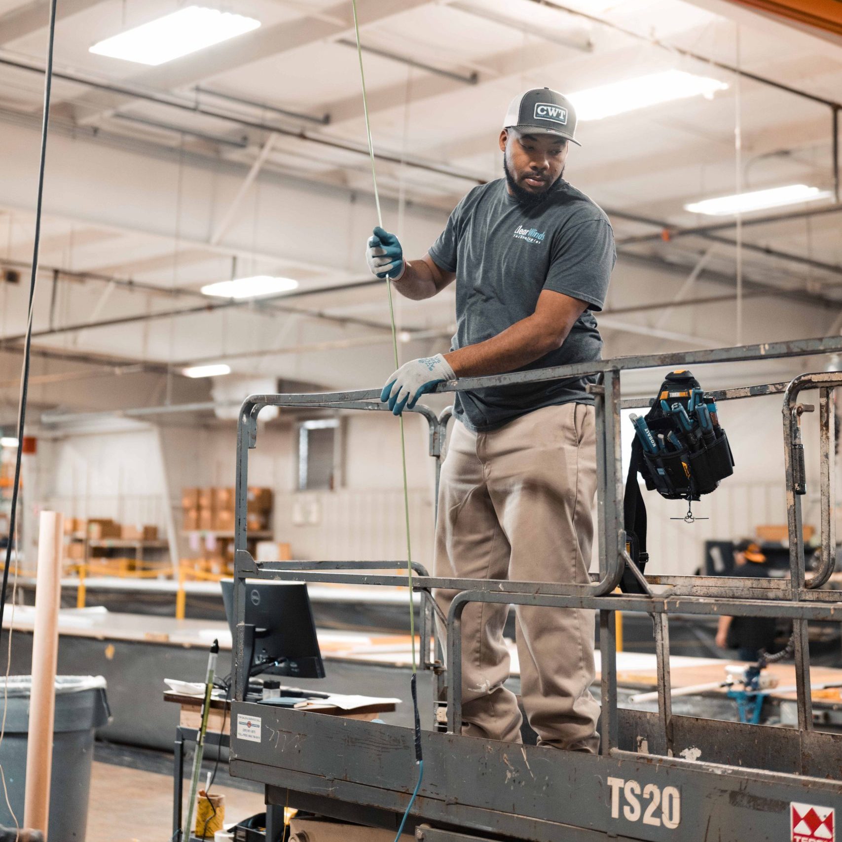 A member of our structured cabling team on a jobsite.
