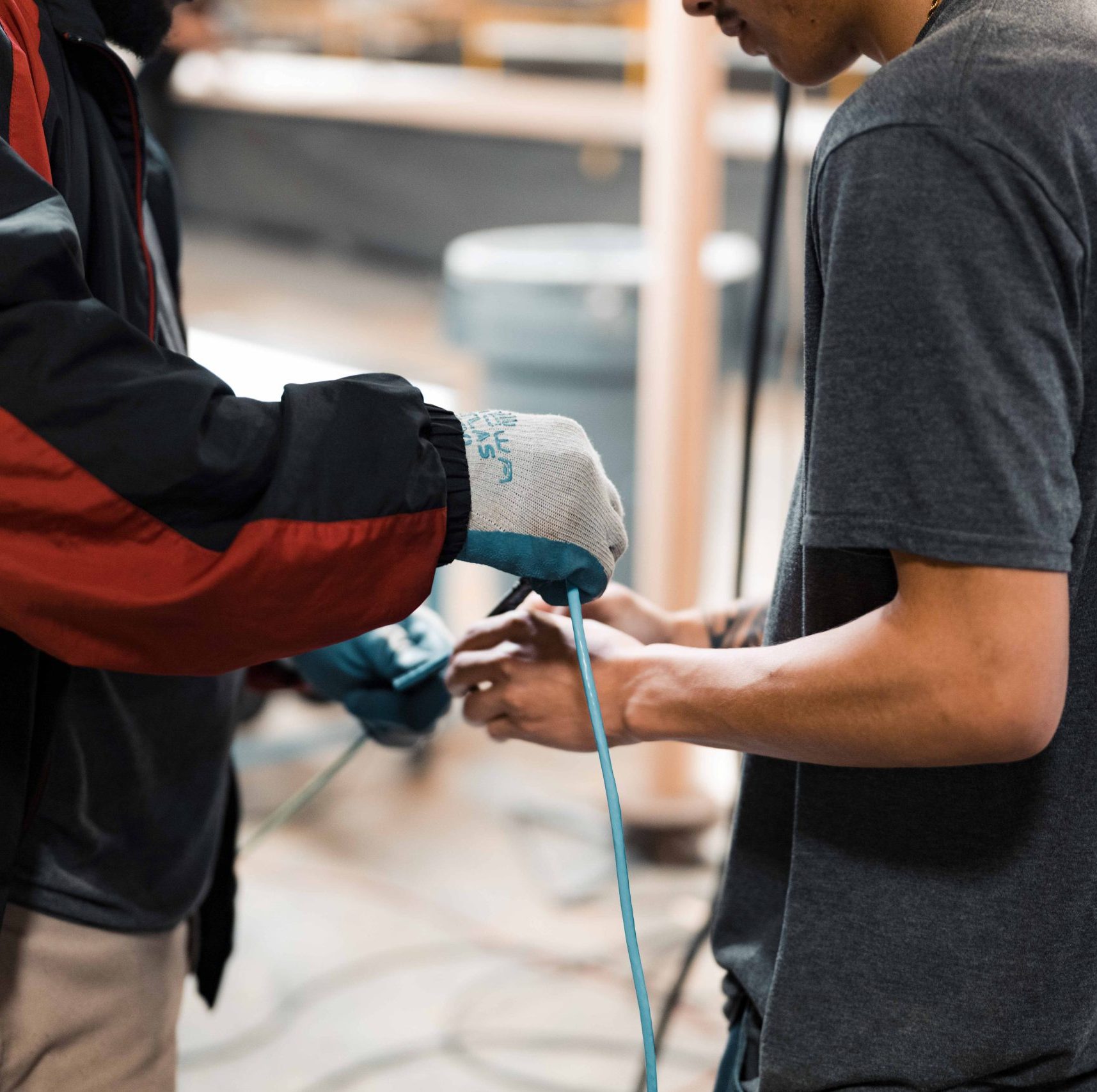 Two members of our structured cabling team on a jobsite.
