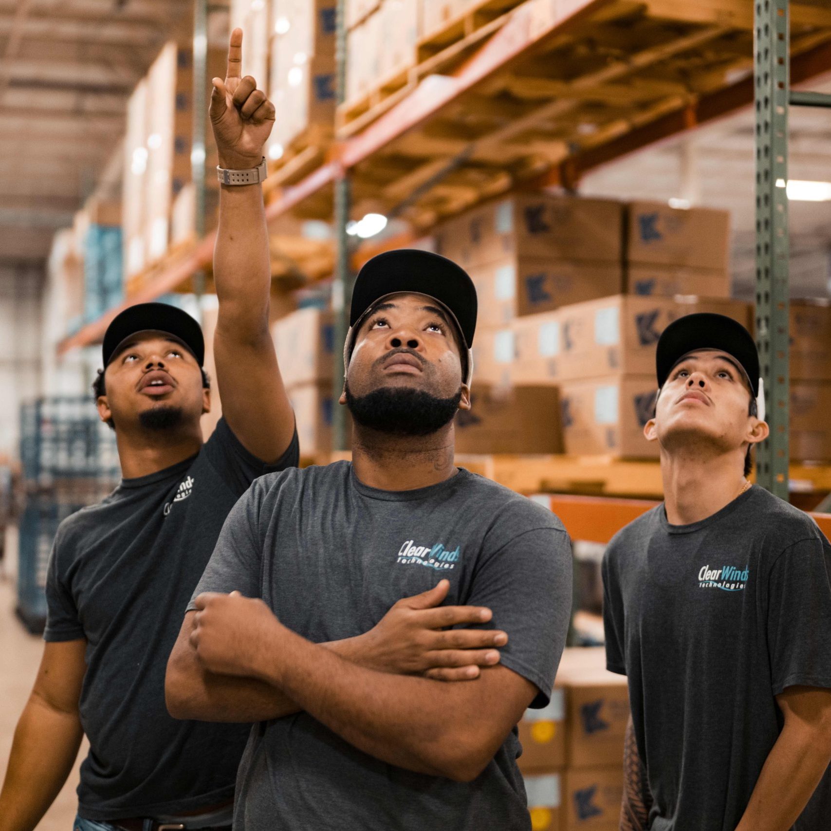 The Clear Winds cabling team at a warehouse.