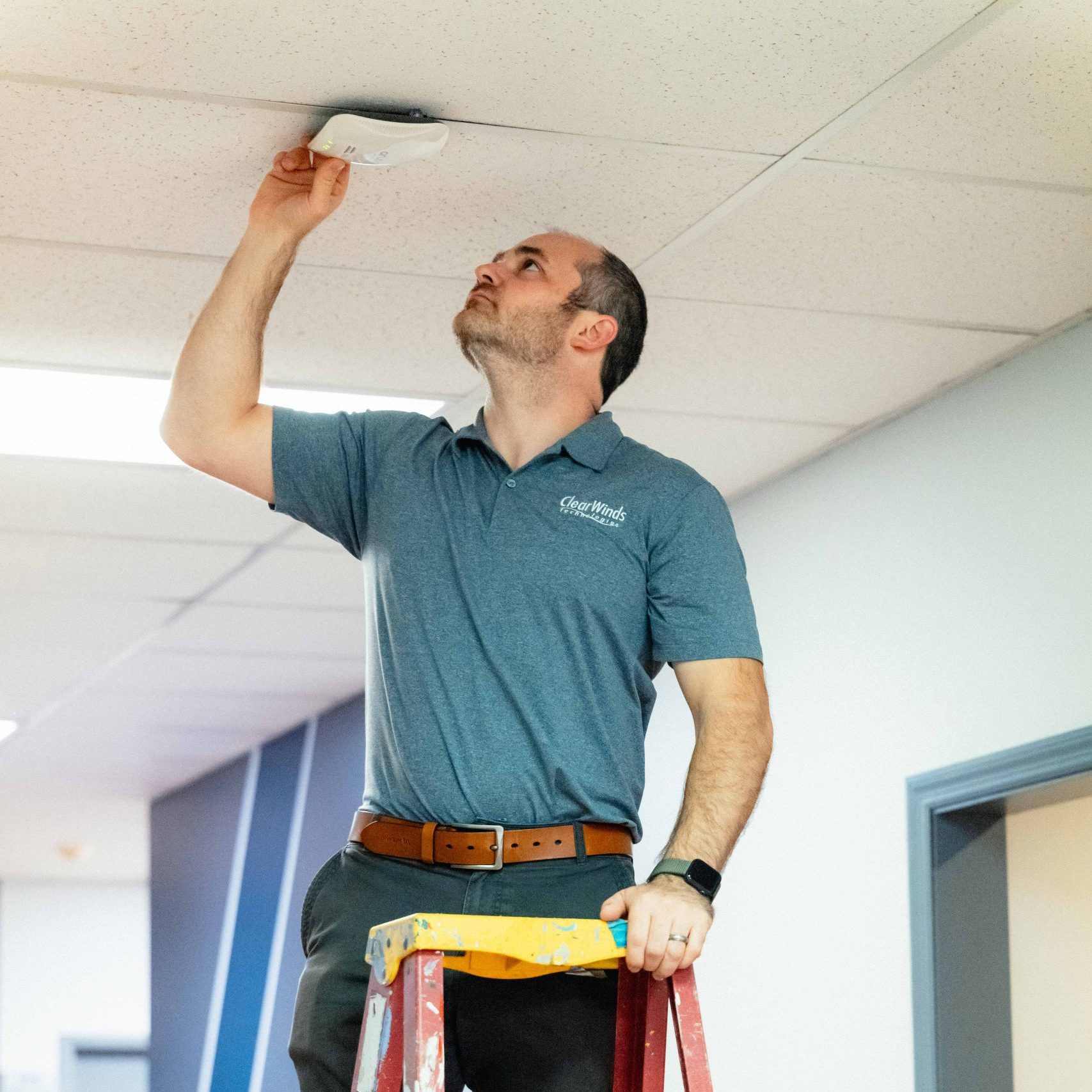 A member of the Clear Winds cabling team on a job site.