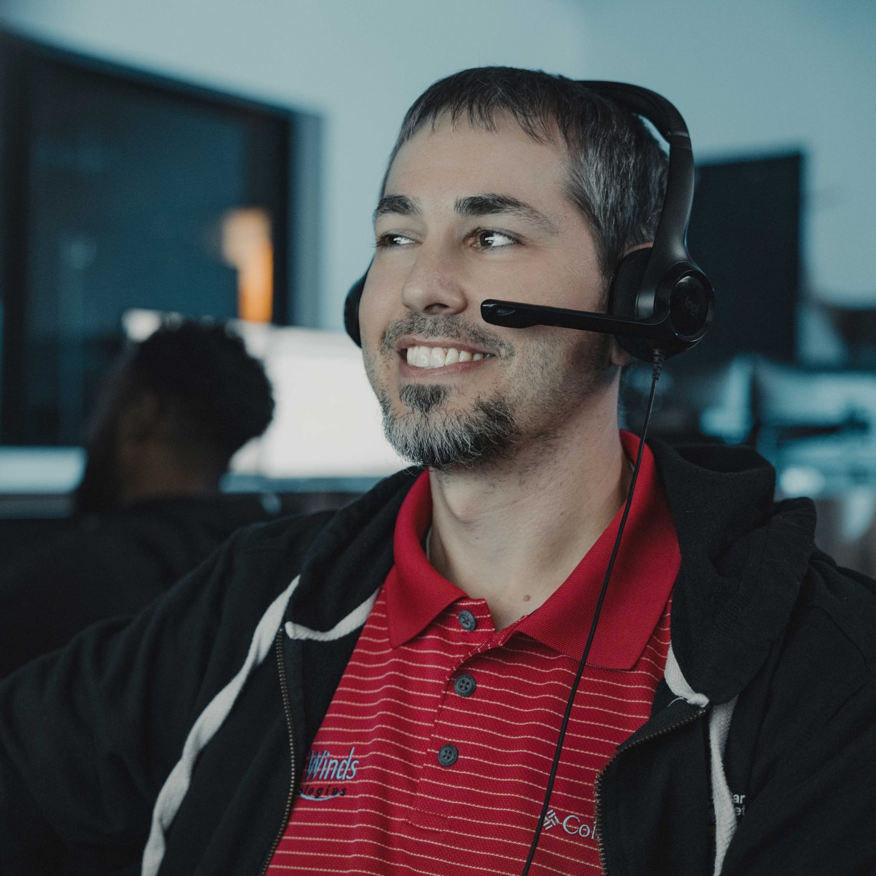 A member of the Managed IT Services in Round Rock team answering a call.