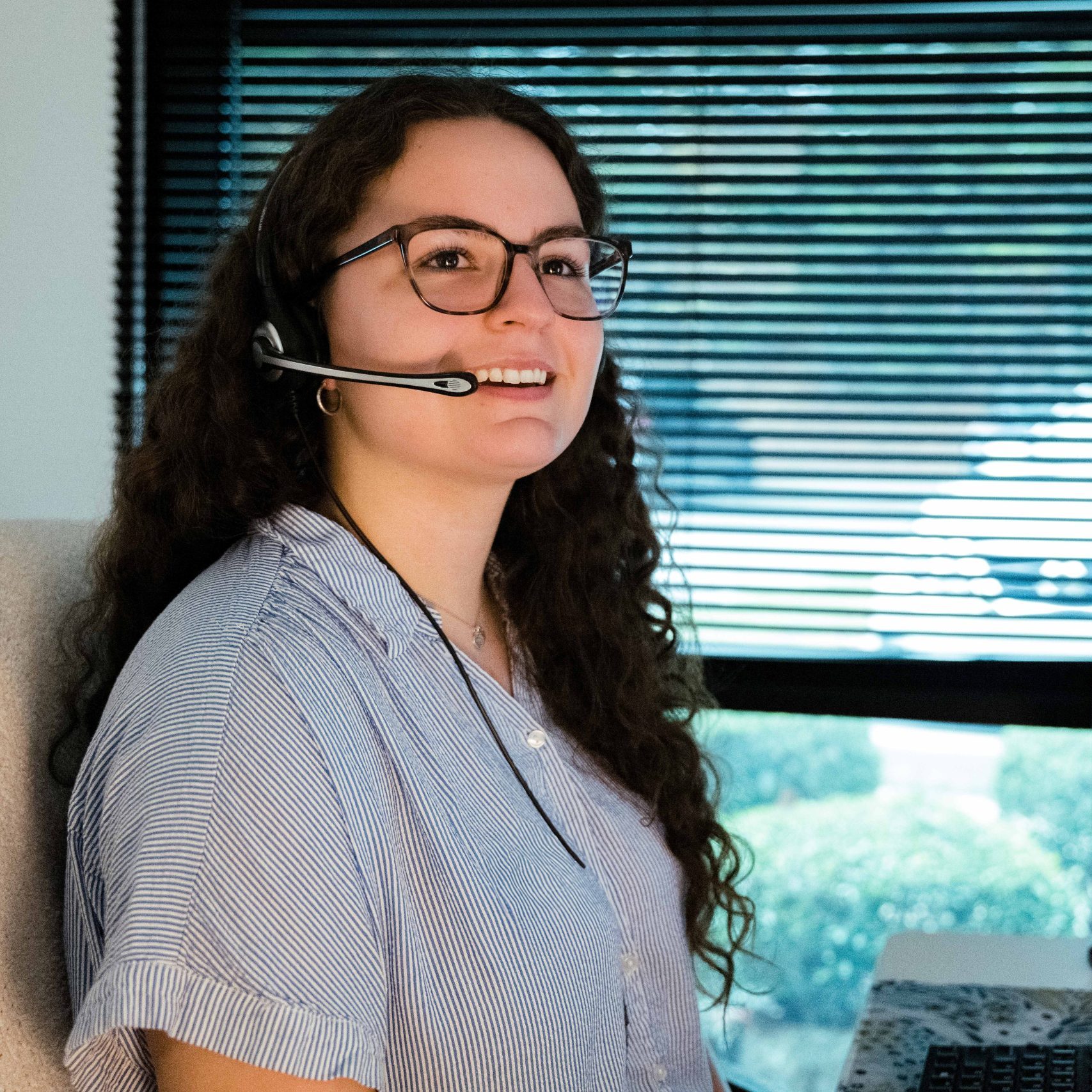 A member of the Clear Winds managed IT services in Cypress team on a call.