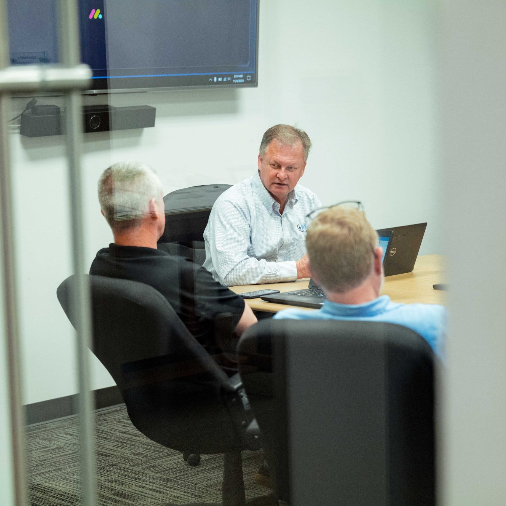 Clear Winds team members in a meeting.