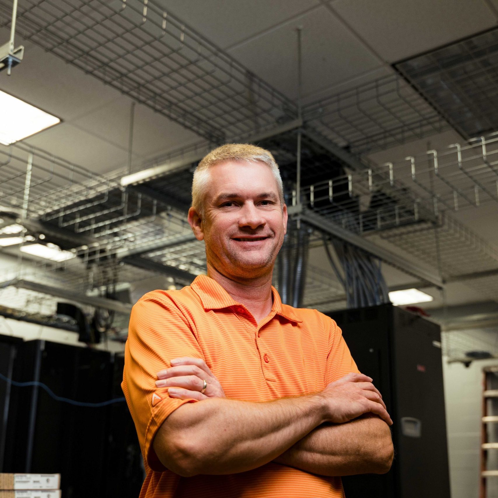 A Clear Winds team member in a data center.