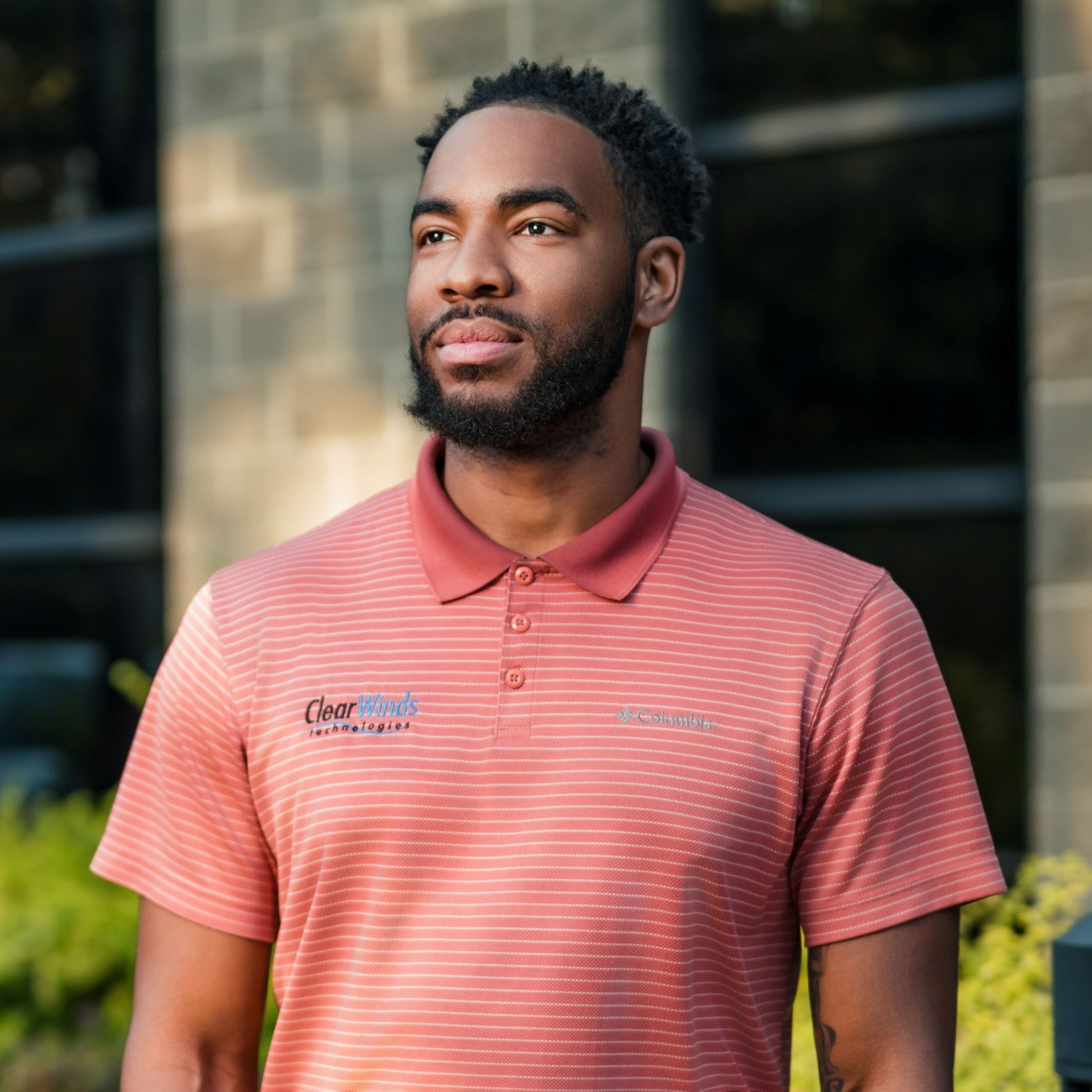 A Clear Winds team member in front of our Fort Worth location.