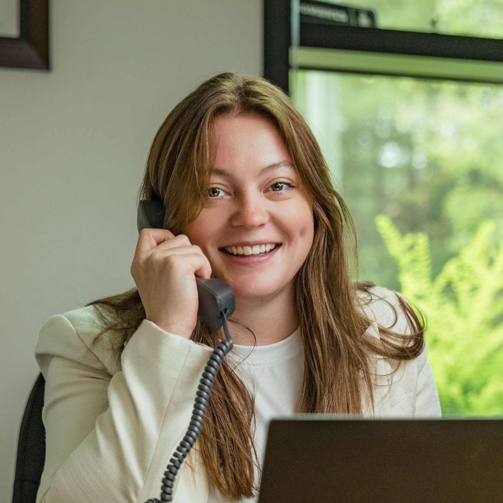 A member of the Clear Winds managed IT services team on a phone call.