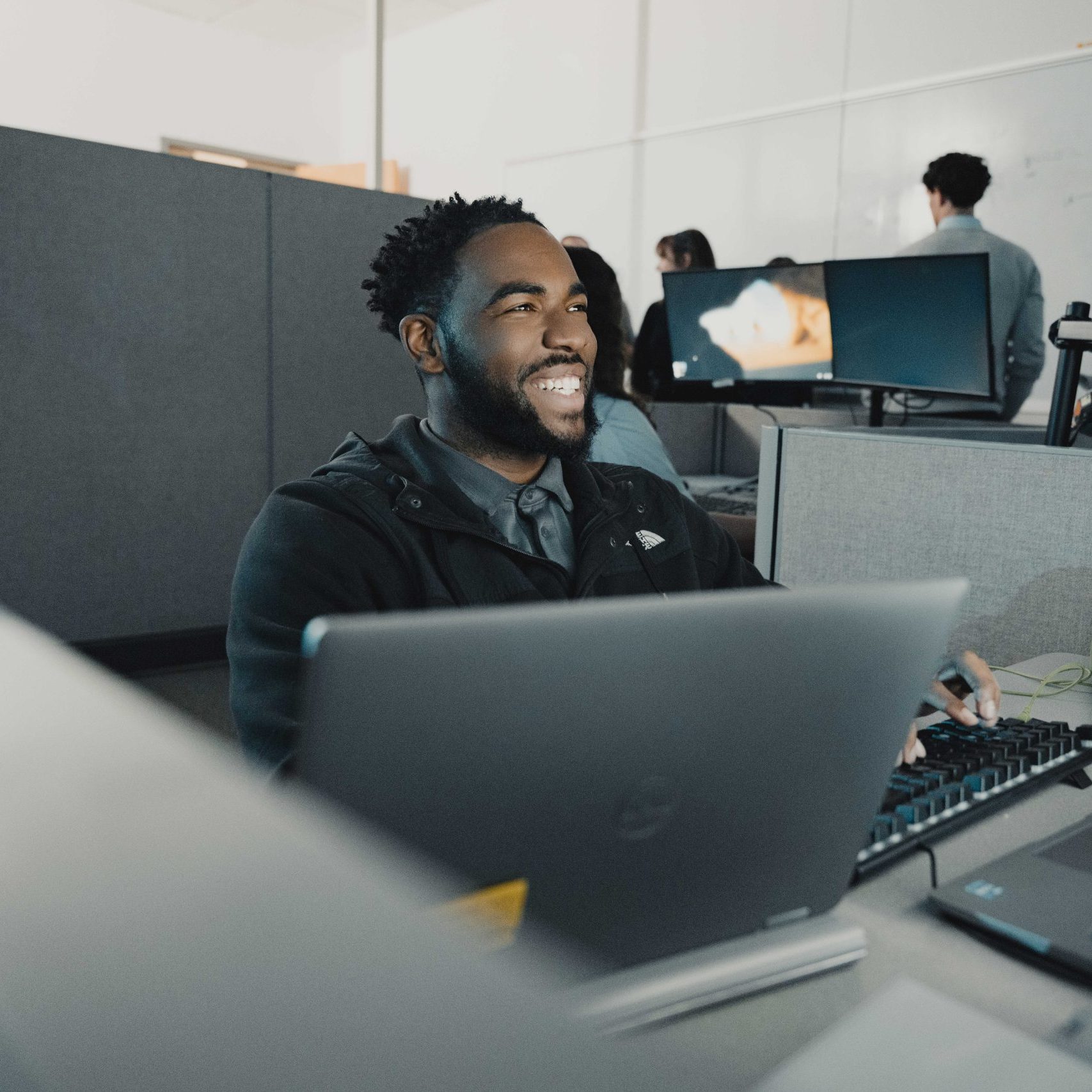 A member of the Clear Winds managed IT services in Sugar Land team at a computer.