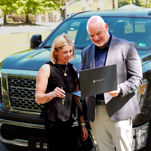 A member of the automotive IT services team with a Clear Winds client.